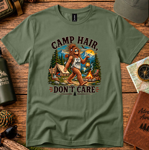 Camp Hair Don't Care Bigfoot graphic T-shirt featuring a playful camping graphic with Camp Hair Don't Care lettering