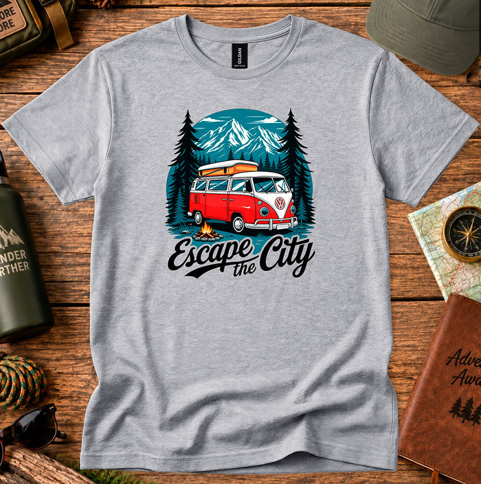 T-shirt featuring a vintage camper van framed by evergreens and mountains
