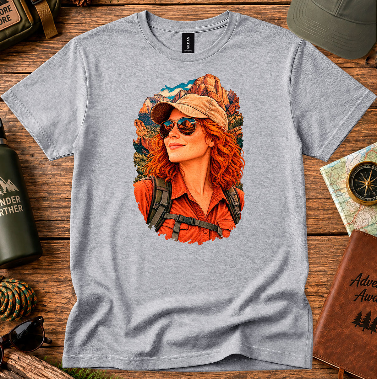 Grey T-shirt featuring a retro portrait of a woman wearing a cap, sunglasses and a red shirt