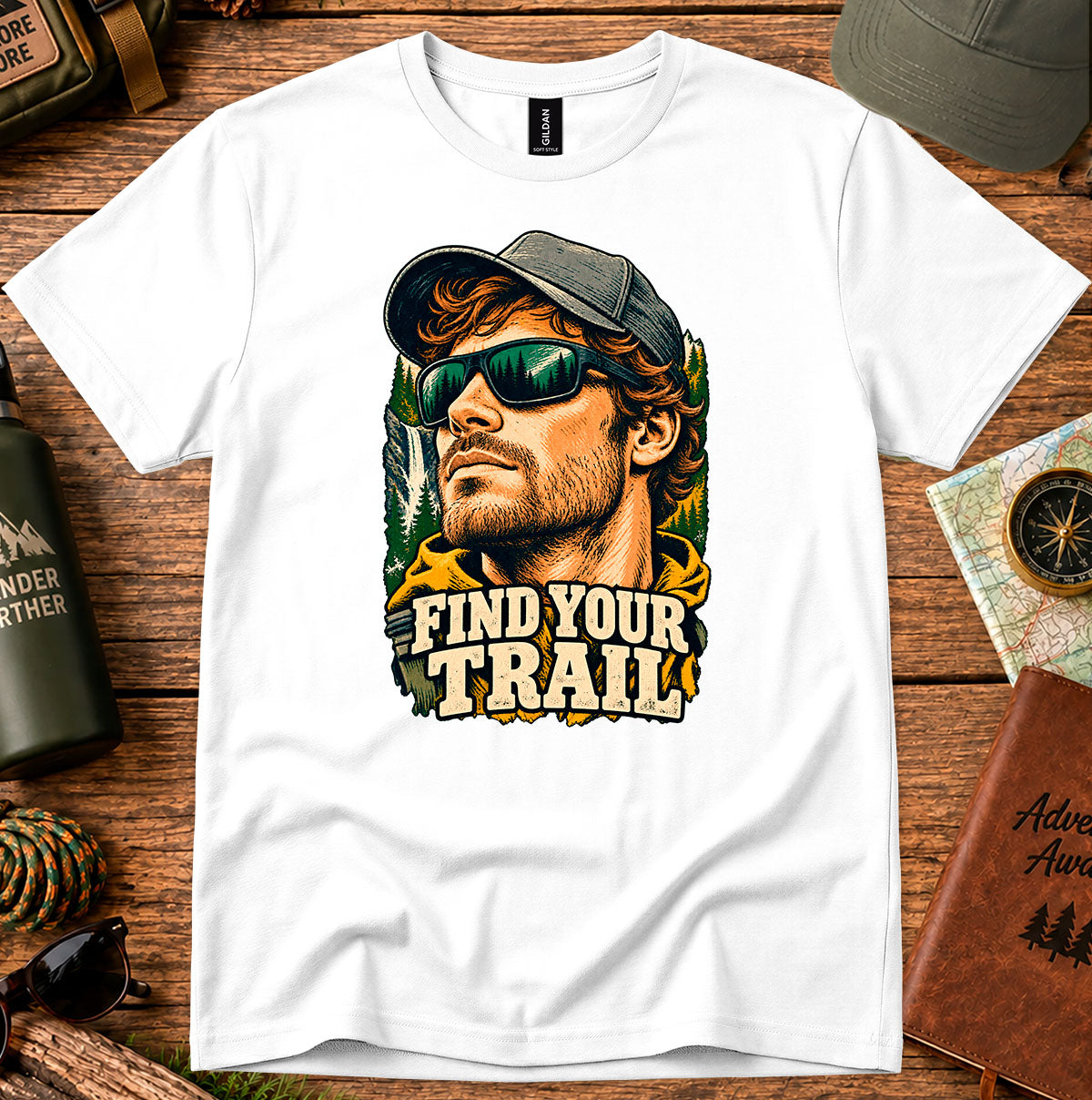 Find Your Trail T-shirt showing a bearded explorer in sunglasses with vintage-style lettering