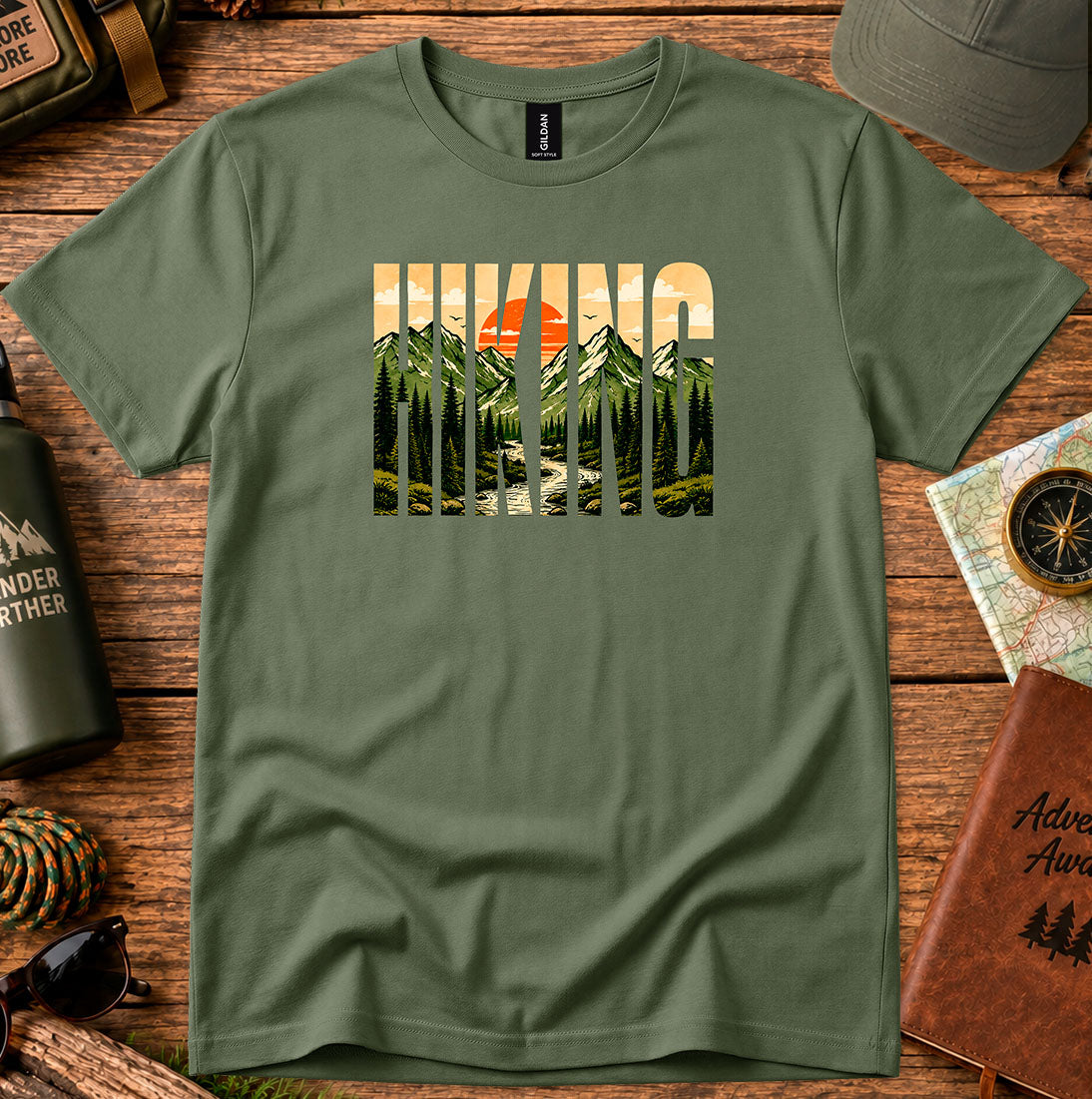 T-shirt featuring bold Hiking lettering filled with mountain and sunset scenery