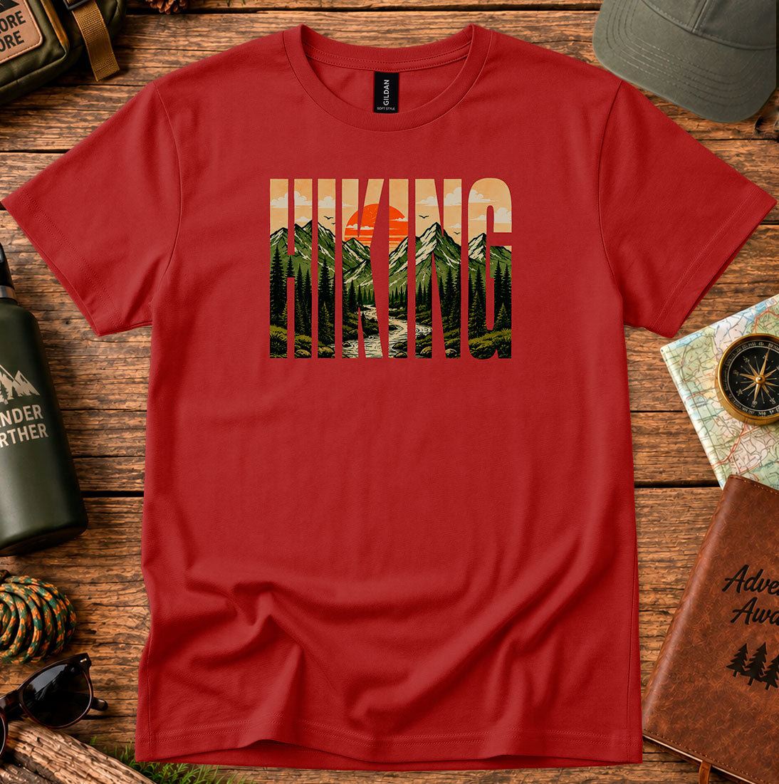 T-shirt featuring bold Hiking lettering filled with mountain and sunset scenery