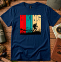Navy T-shirt with bold HIKING lettering, retro color panels and a backpacker silhouette