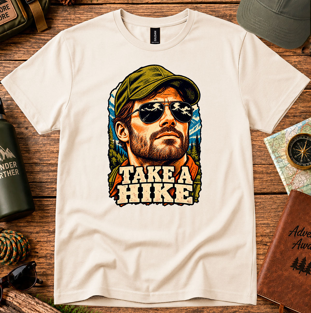 Take a Hike T-shirt featuring a bearded hiker wearing a cap and sunglasses
