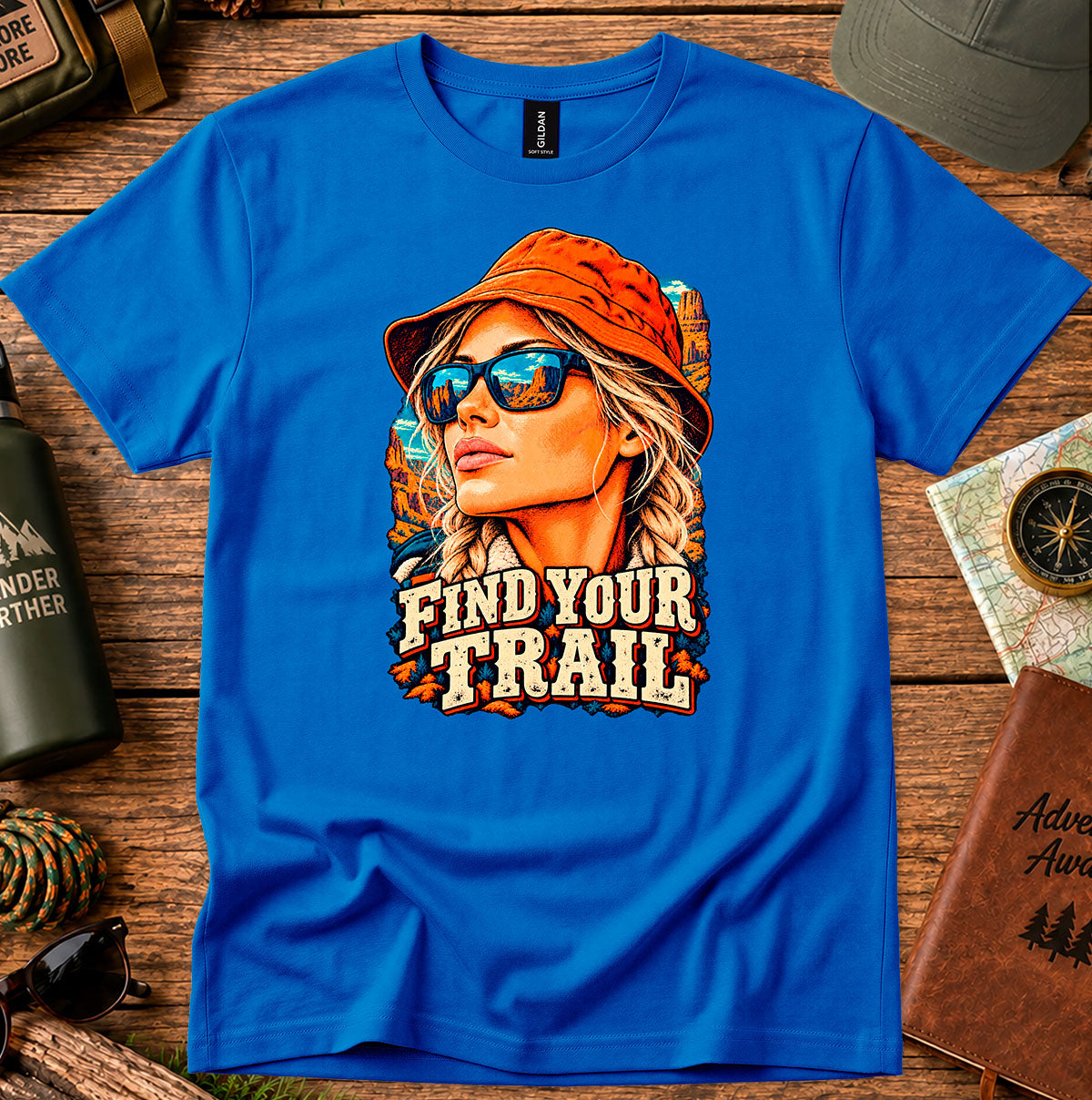 Find Your Trail T-shirt with a vintage woman adventurer wearing a hat and mirrored sunglasses