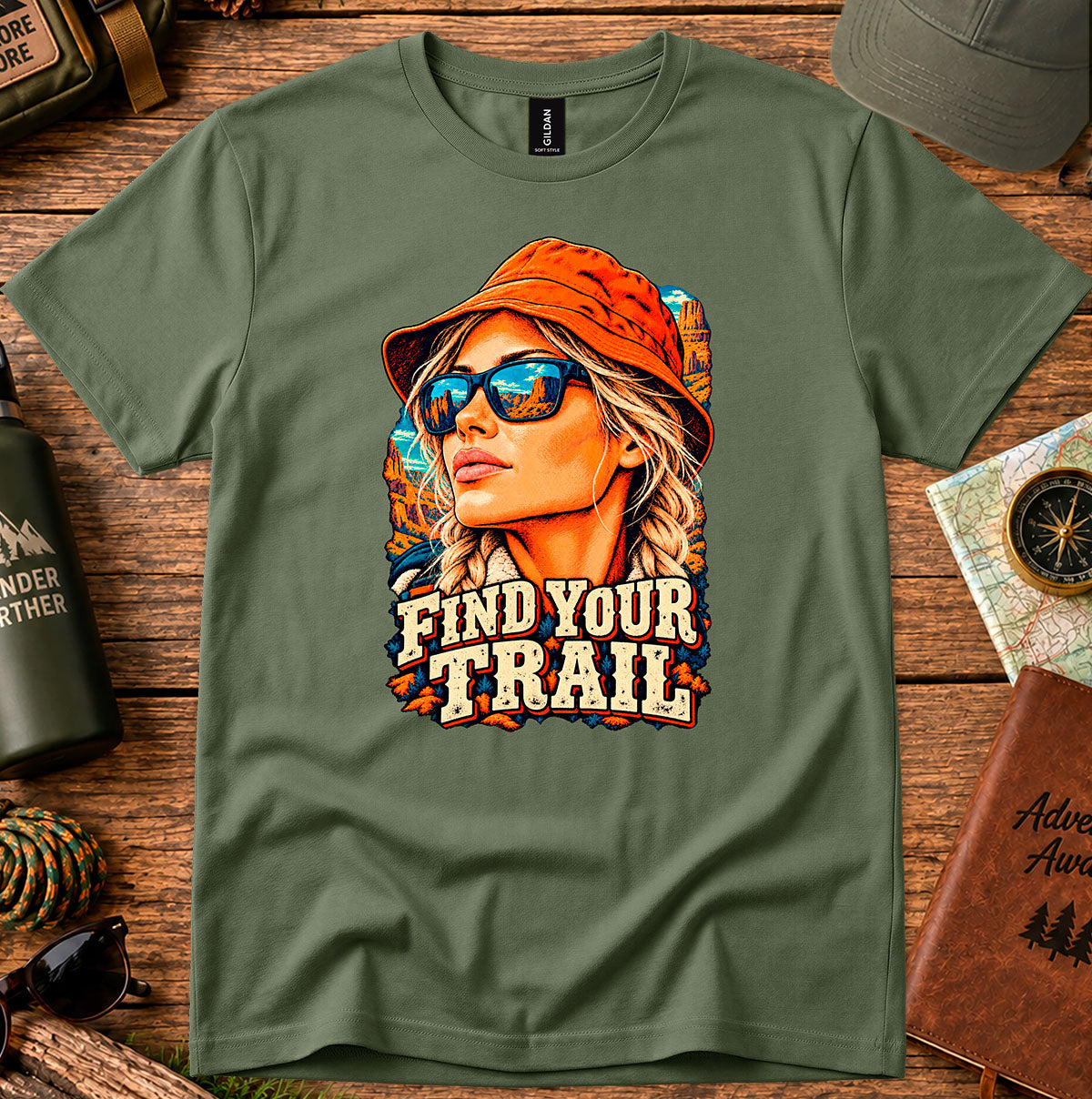 Find Your Trail T-shirt with a vintage woman adventurer wearing a hat and mirrored sunglasses