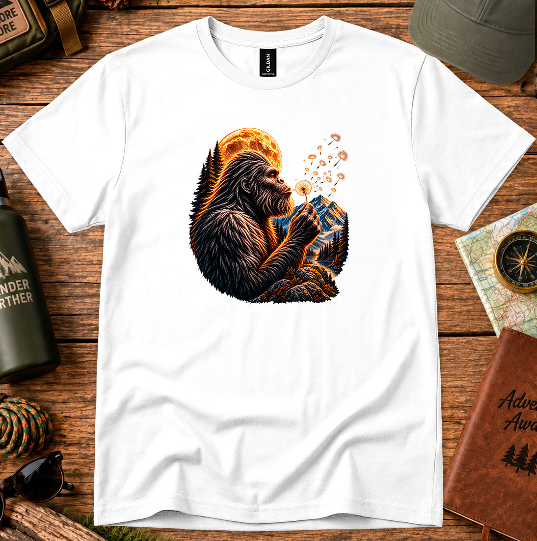 T-shirt featuring a gorilla blowing dandelion seeds beneath a glowing moon