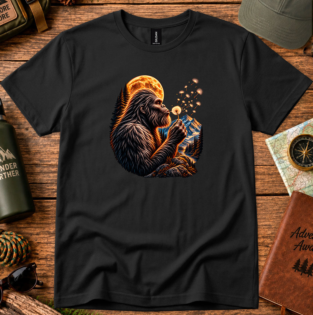 T-shirt featuring a gorilla blowing dandelion seeds beneath a glowing moon