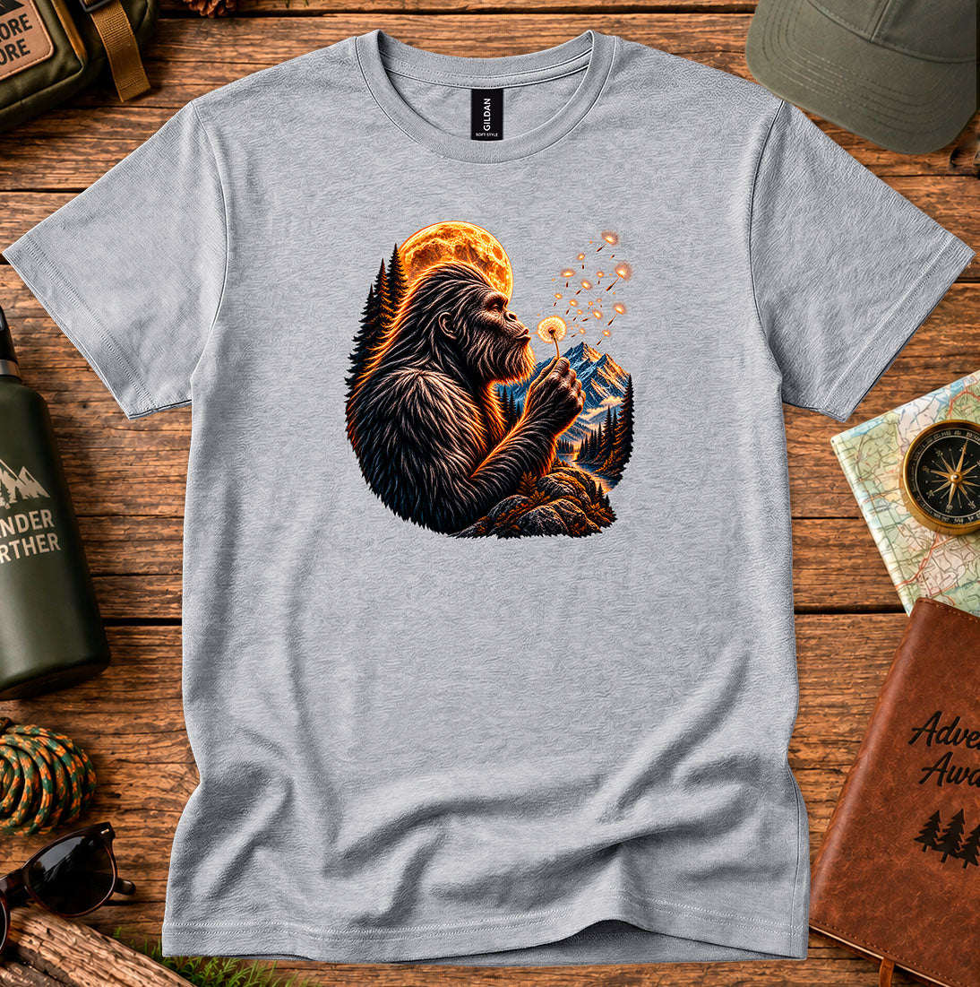 T-shirt featuring a gorilla blowing dandelion seeds beneath a glowing moon