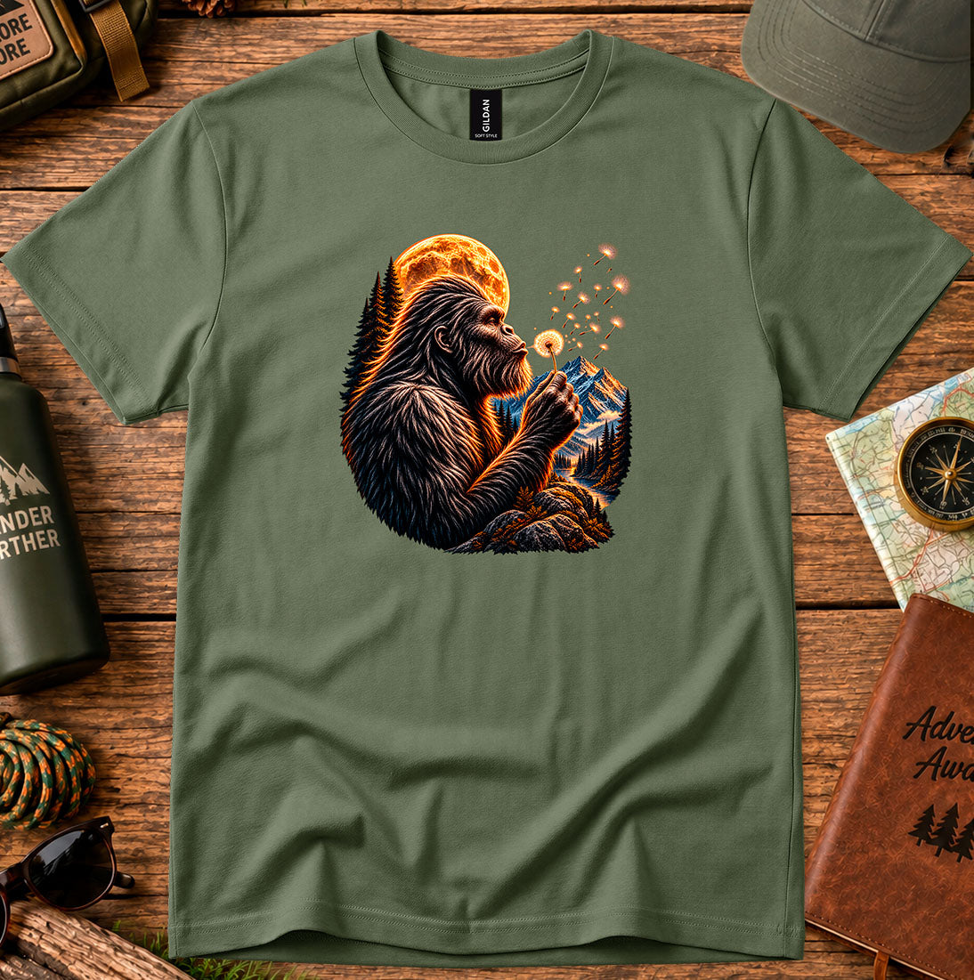 T-shirt featuring a gorilla blowing dandelion seeds beneath a glowing moon