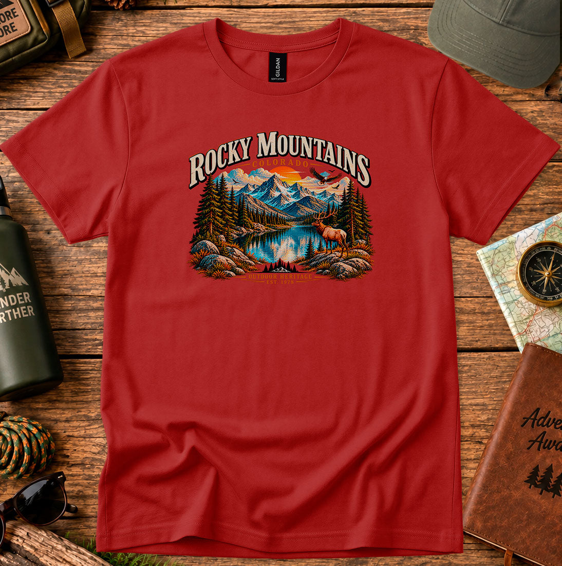 T-shirt featuring Rocky Mountain peaks, pine forests and an elk by an alpine lake