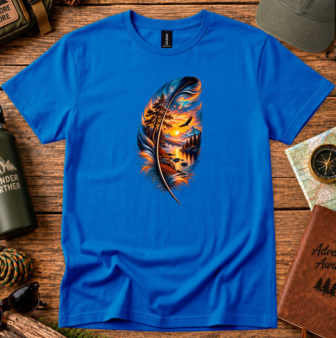 T-shirt featuring a feather framing a sunset shoreline and a soaring bird