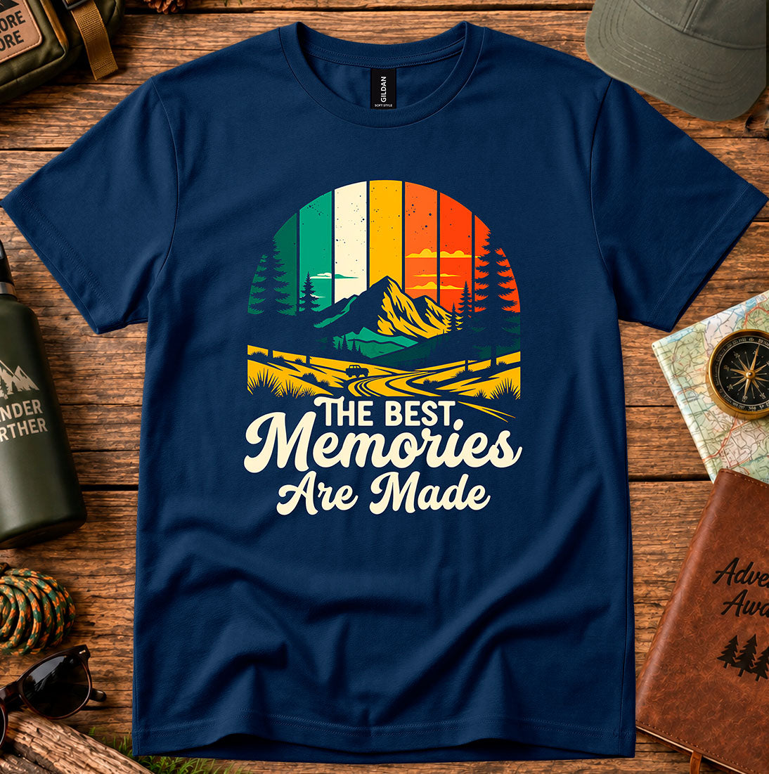 T-shirt featuring sunset stripes, pine silhouettes and a mountain camping scene