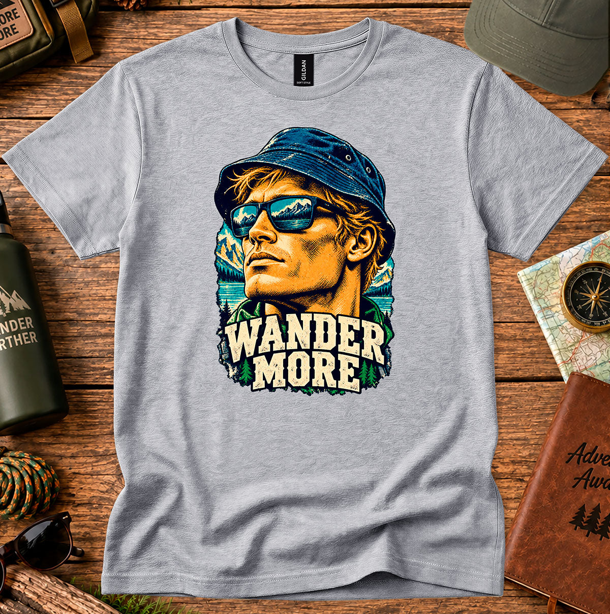 Wander More T-shirt featuring a retro traveller portrait framed by palm trees