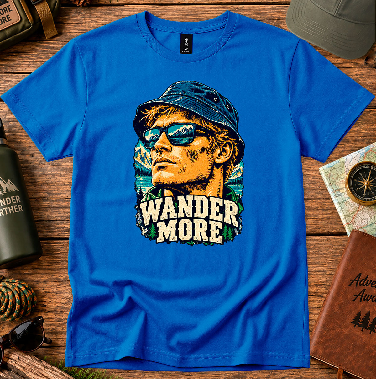 Wander More T-shirt featuring a retro traveller portrait framed by palm trees