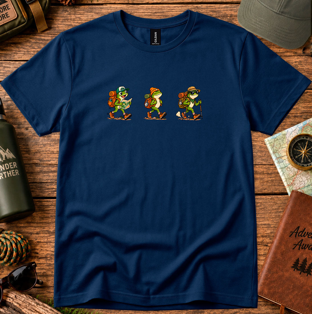 T-shirt featuring a playful trio of vintage-style hiking frogs