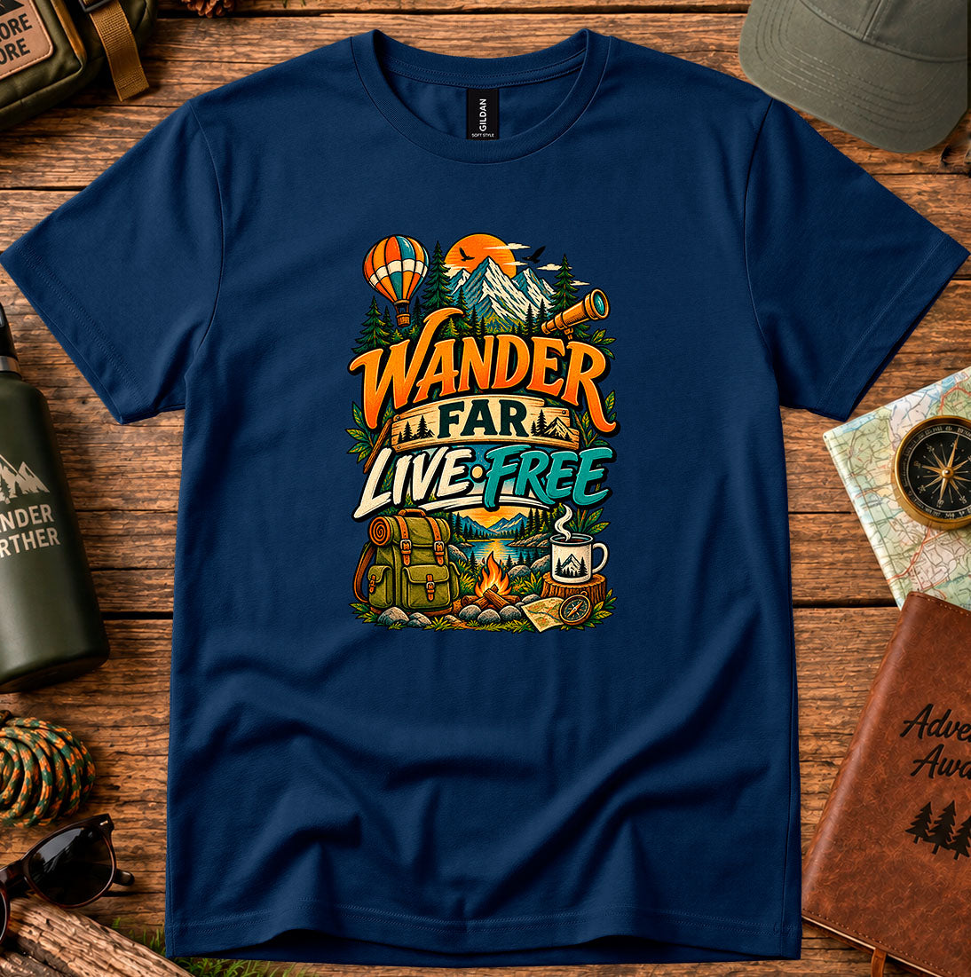 T-shirt featuring a mountain camp scene with a hot air balloon and campfire