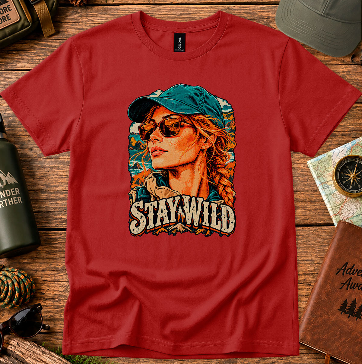 Stay Wild T-shirt with a retro portrait of a braided-haired woman wearing a cap and sunglasses