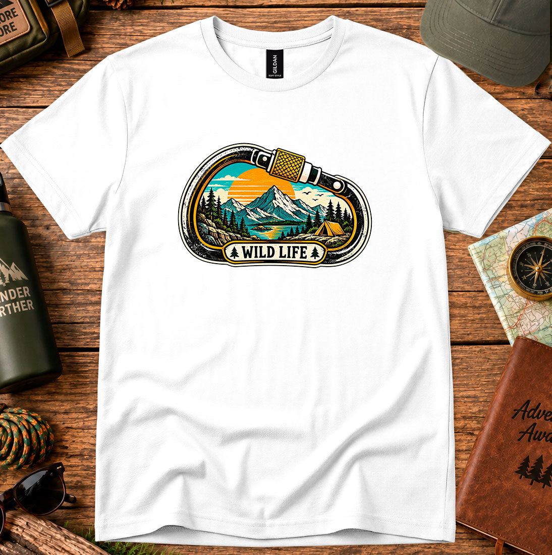 T-shirt featuring a carabiner framing mountain peaks, pine trees and a winding river