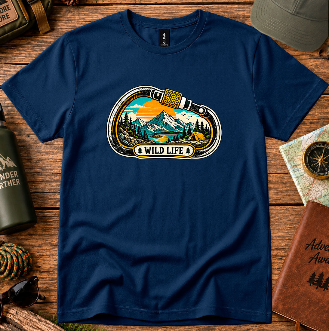 T-shirt featuring a carabiner framing mountain peaks, pine trees and a winding river