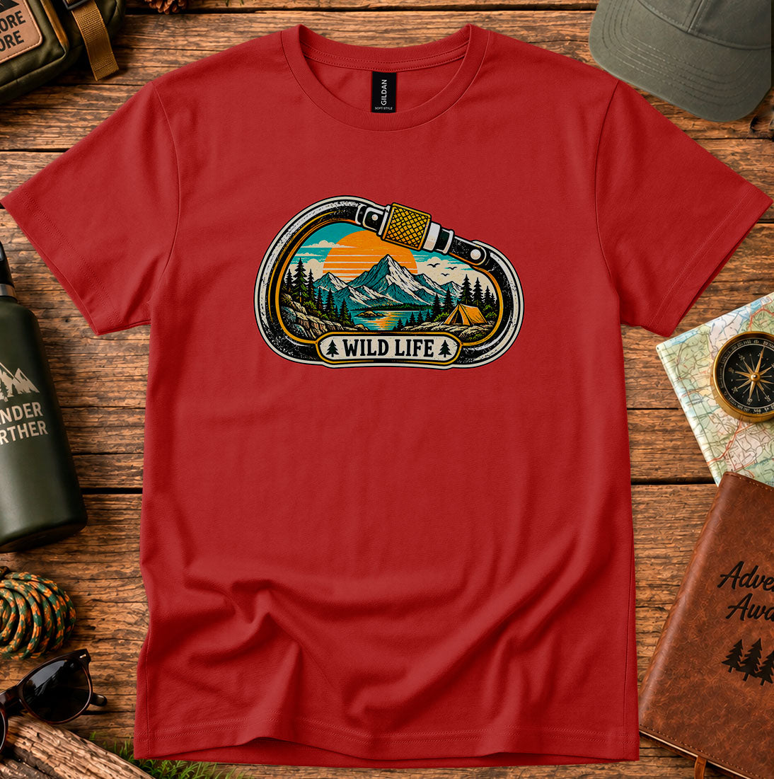 T-shirt featuring a carabiner framing mountain peaks, pine trees and a winding river